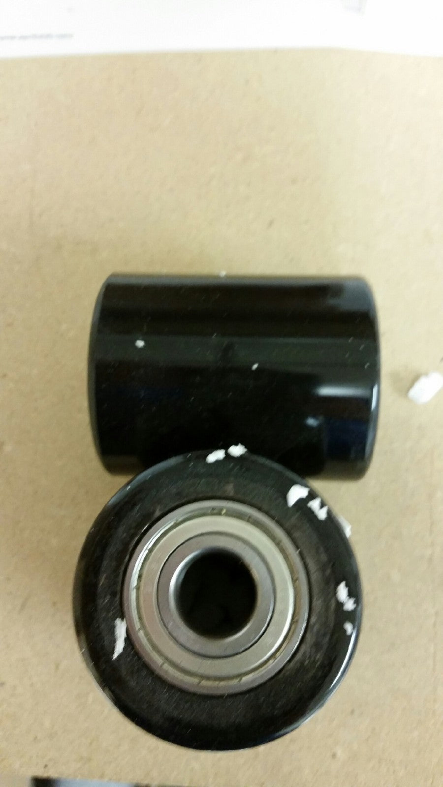 A Pair of Brand New Pallet Jack Poly Load Wheels With Bearings