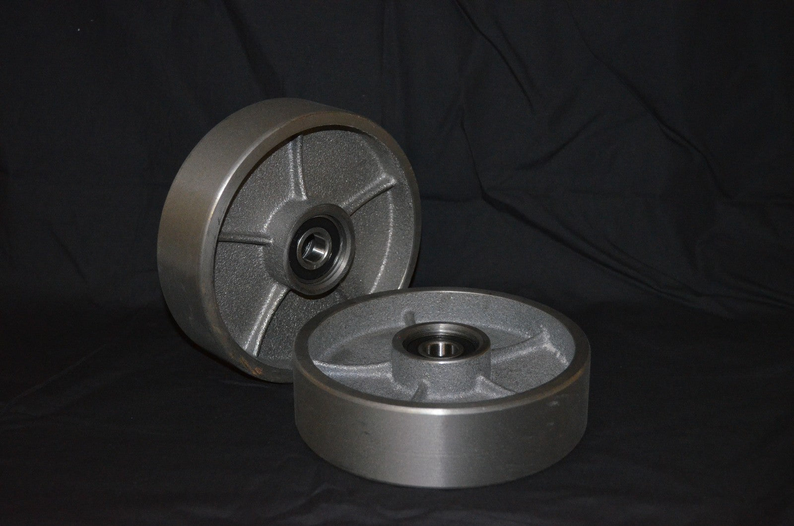 A Pair of Brand New Pallet Jack Steel Steer Wheels With Bearings